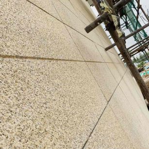 许昌 黄金麻花岗岩荔枝面外墙干挂石材效果示例