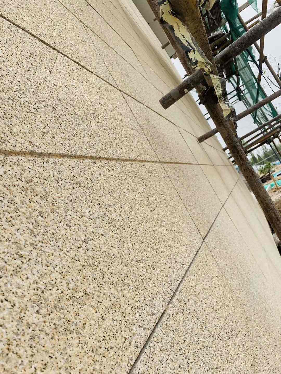 许昌 黄金麻花岗岩荔枝面外墙干挂石材效果示例